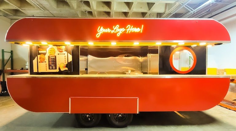 Red concession trailer shell with placeholder "Your Logo Here" signage, ready for custom branding